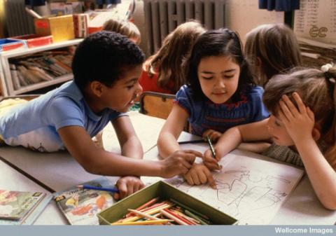 3 children drawing 