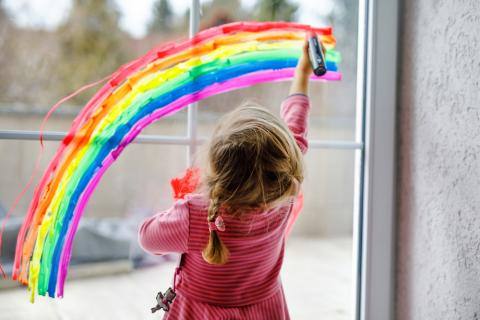 Girl Draws Rainbow