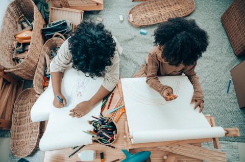 two kids drawing