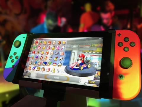 Switch game console with Mario Kart on the screen