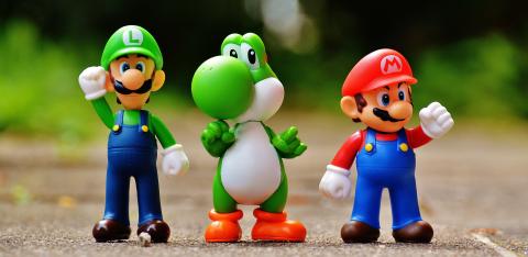 Luigi, Yoshi, and Mario figures