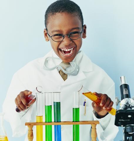 Boy doing science experiment