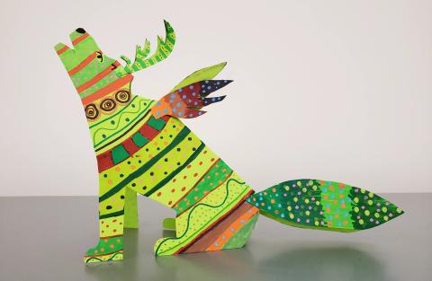 Wolf alebrije with wings, antlers, and a tail