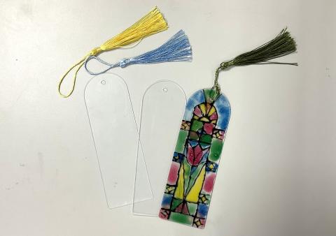 2 blank bookmarks, yellow tassel, blue tassel, and 1 sample bookmark with green tassel