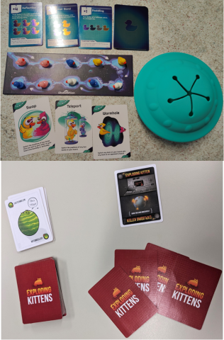 Game pieces from Abducktion game and Exploding Kittens game