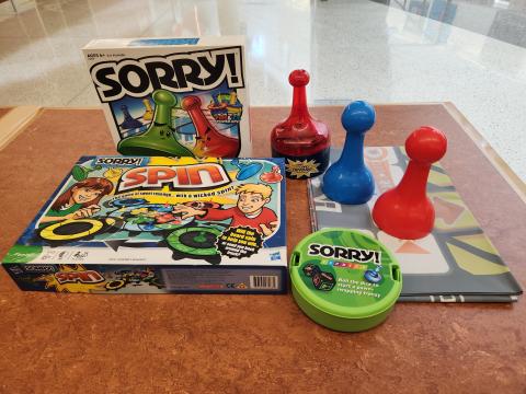 Sorry games on table: Sorry, Spin, Express, Card Revenge, and Jumbo.