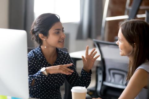 two people in conversation