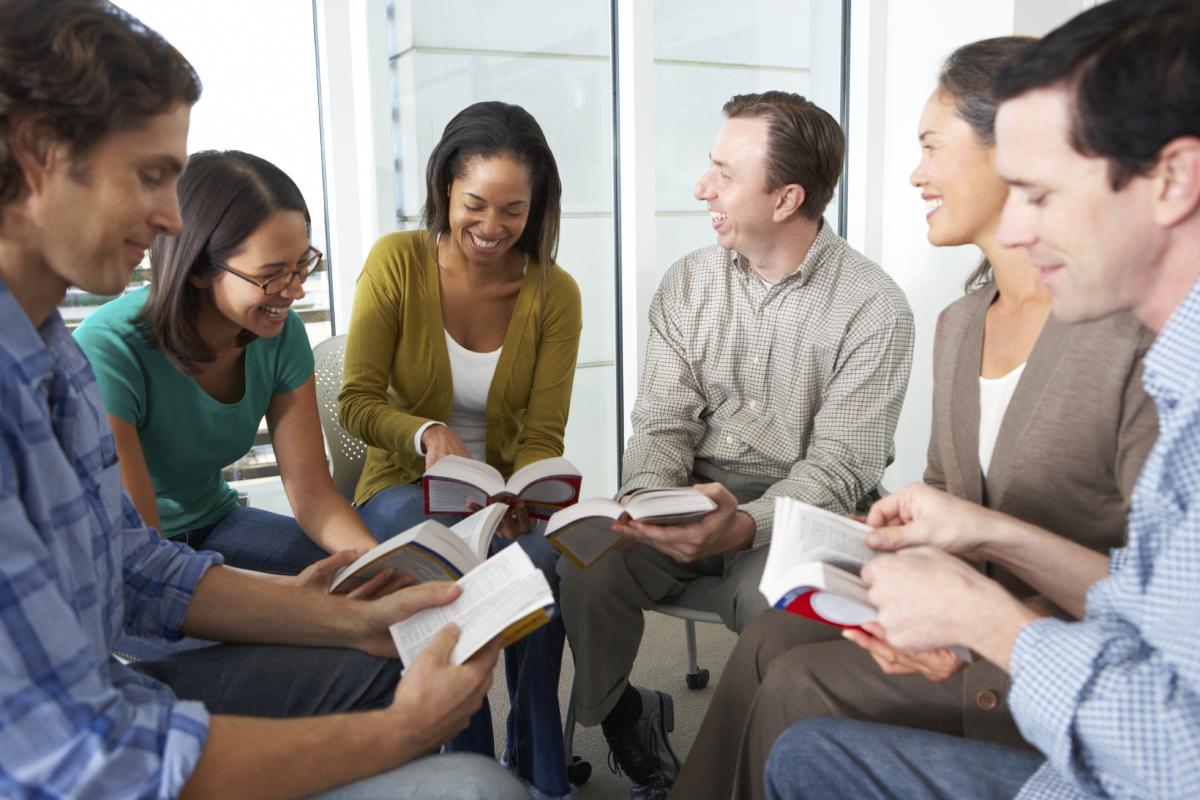 Adults reading together